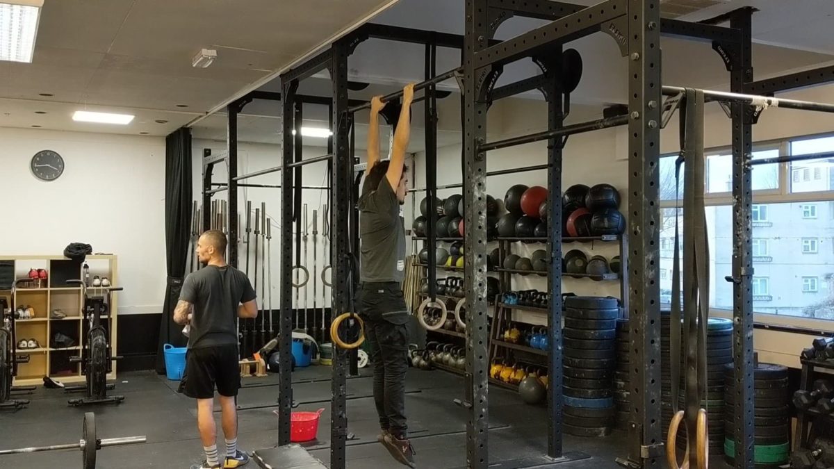 Pull-up start position, a dead hang